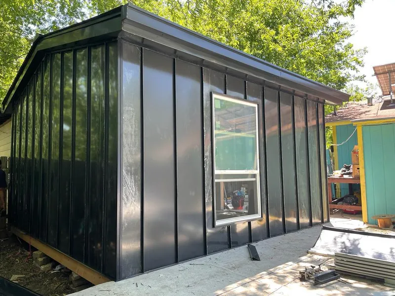 Black standing seam metal wall panels for Roof Inspection in Germantown