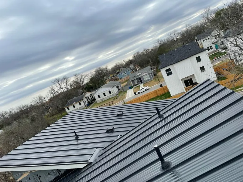 Standing seam metal roof panels with vents for Skylight Repair in Germantown